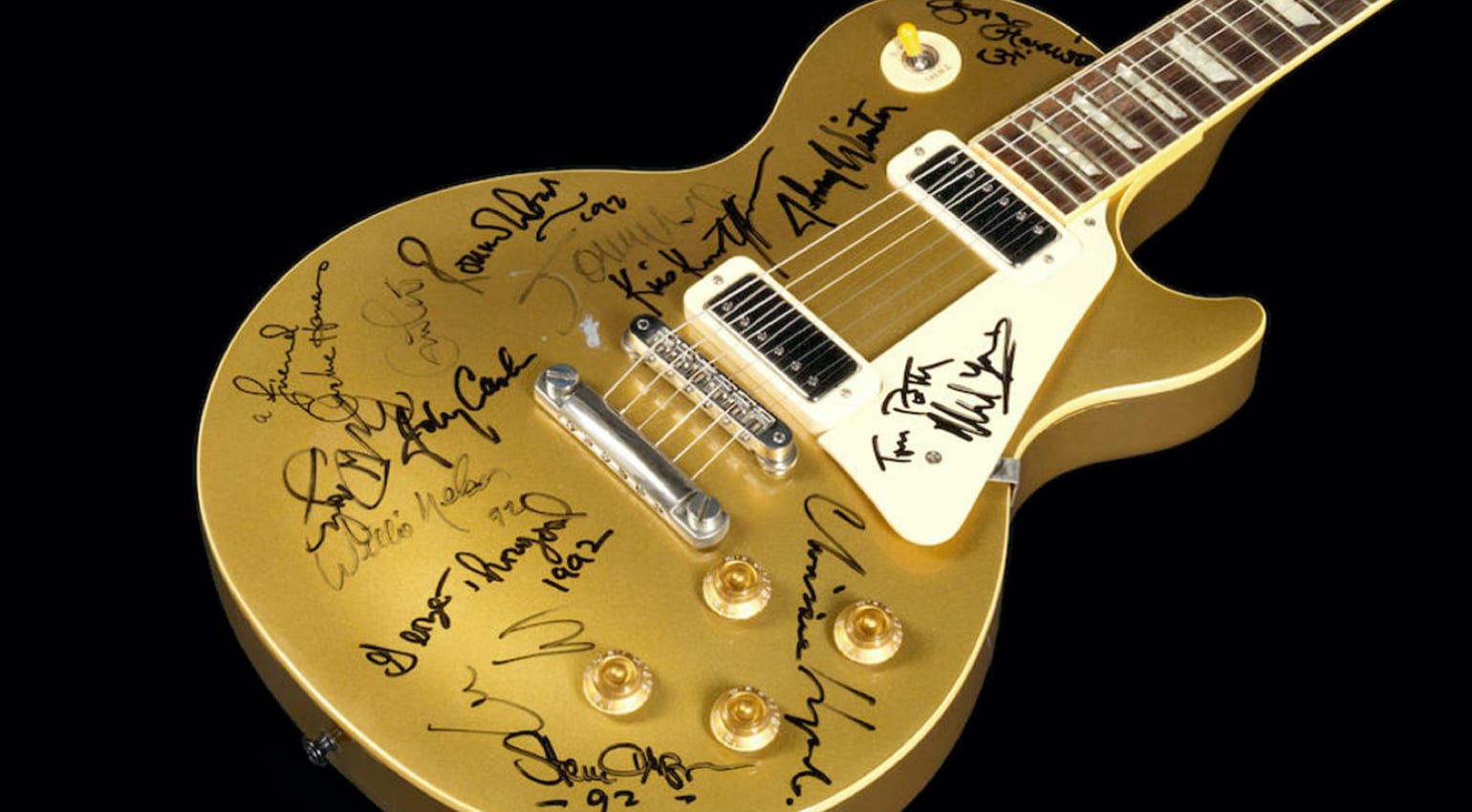 Subasta de una Gibson Les Paul Goldtop firmada por leyendas de la música en  el concierto del 30 aniversario de Dylan - gearnews.es