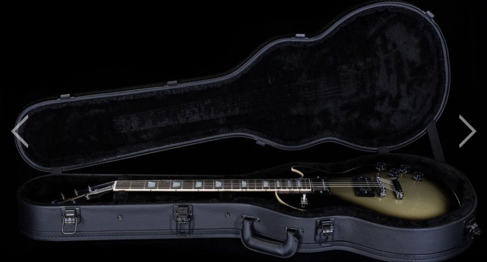 Gibson Adam Jones Silverburst Les Paul Standard en un estuche negro normal